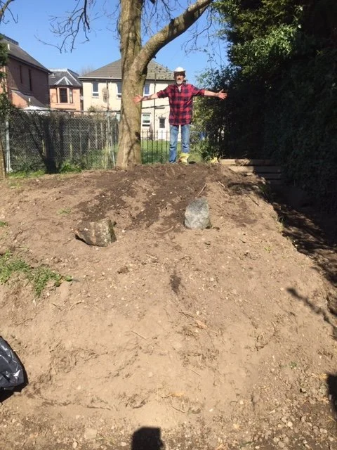 Planting potatoes.JPG