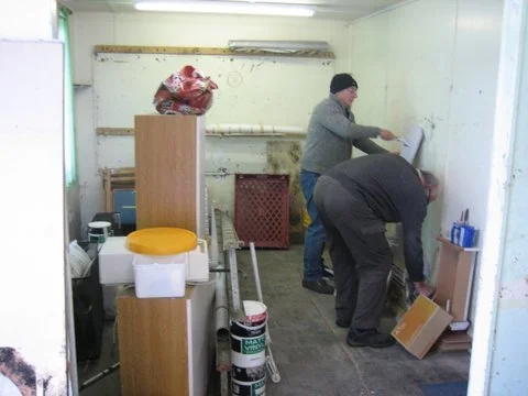 The workshop as it was - Bob and John sorting it out