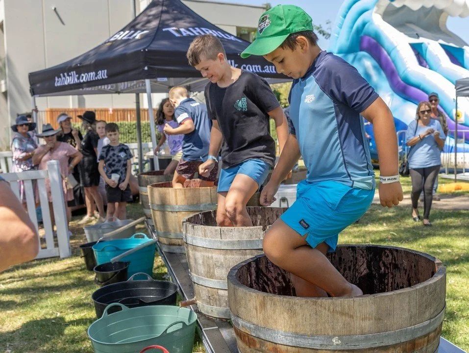 Tahbilk Great Grape Stomp is back at NOW Festival! 👣🍇

Get ready for fast feet, fierce fun, and a whole lot of grape-squishing action!

Join us at the Tahbilk Great Grape Stomp, proudly sponsored by Tahbilk Wines, as part of the Nagambie on Water F