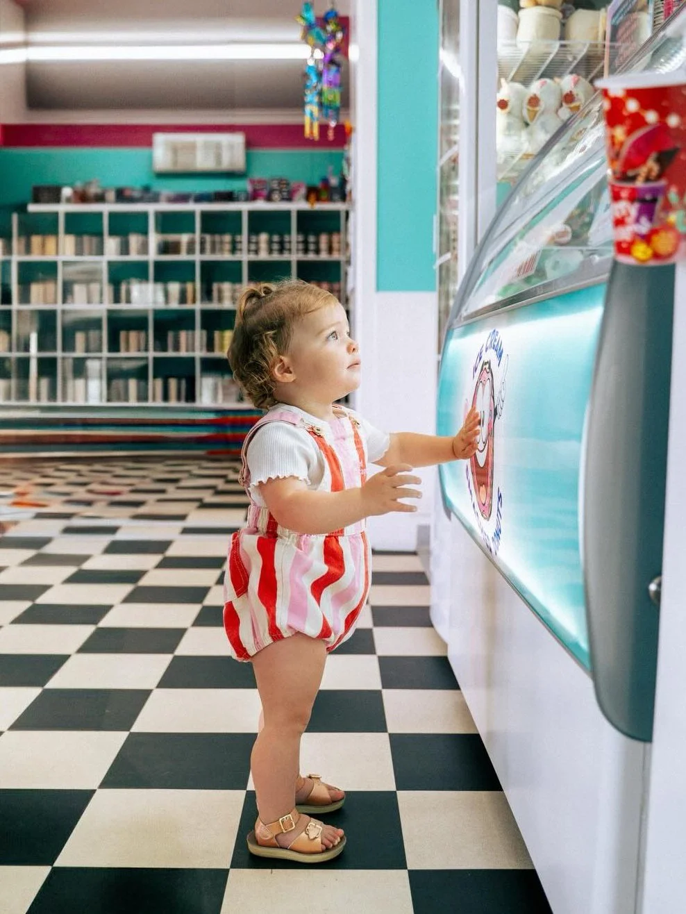 The hardest decision of the day: sprinkles, chocolate, or another scoop? Childhood is full of the sweetest choices at @amandaloussweetsandtreats

Captured by: @lovebylou_photography
