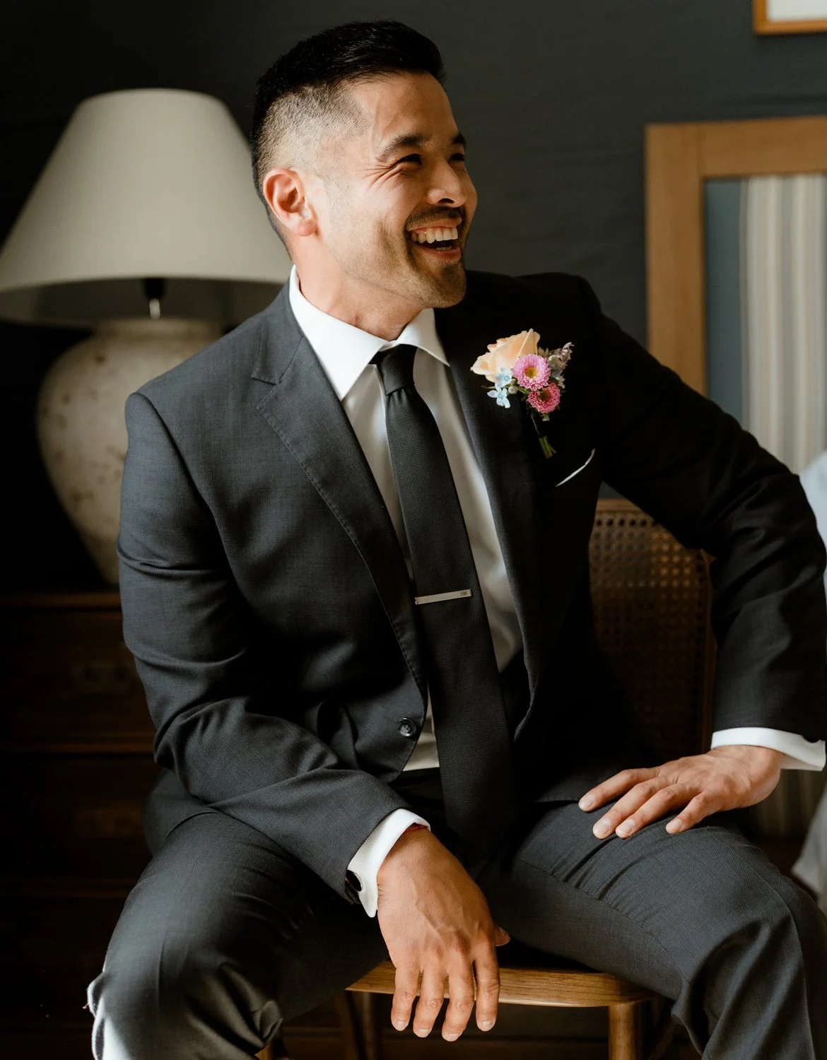 groom laughing at millbrook wedding in queenstown