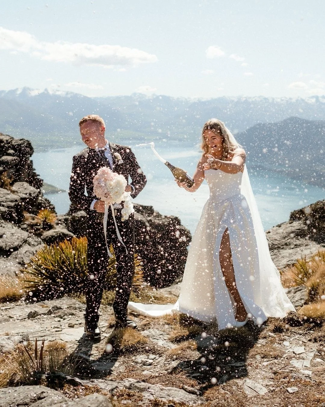 Tori &amp; Fletcher had one of those days that was just perfect from start to finish.

Sunny afternoon ceremony at 7 Mile, then up to Cecil Peak for the heli landing, where Fletcher absolutely nailed the champagne pop.
And to top it off, a surprise v
