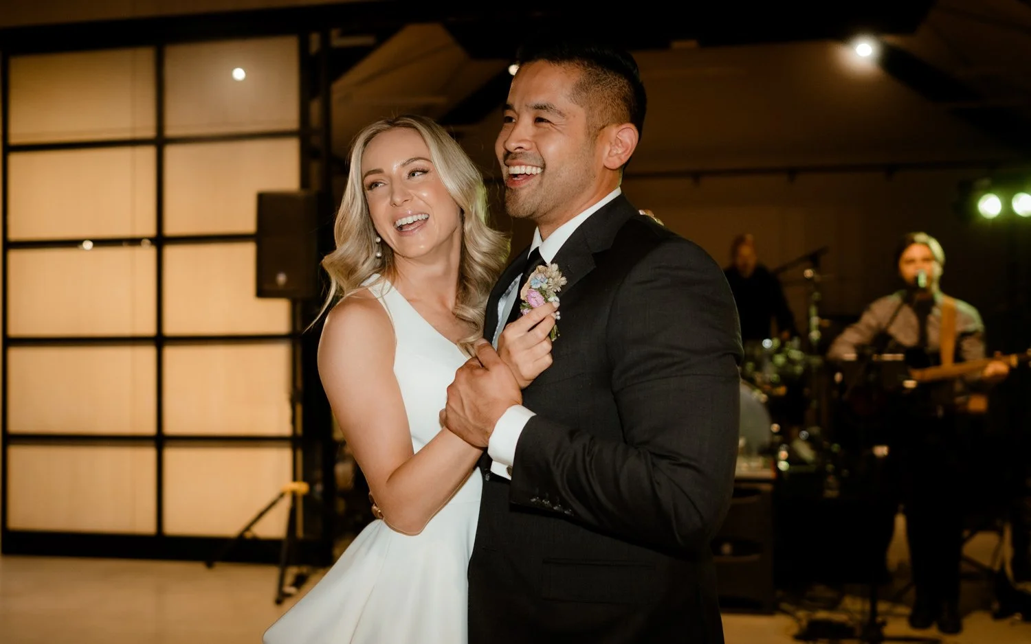 Bride and groom laughing during first dance in Queenstown