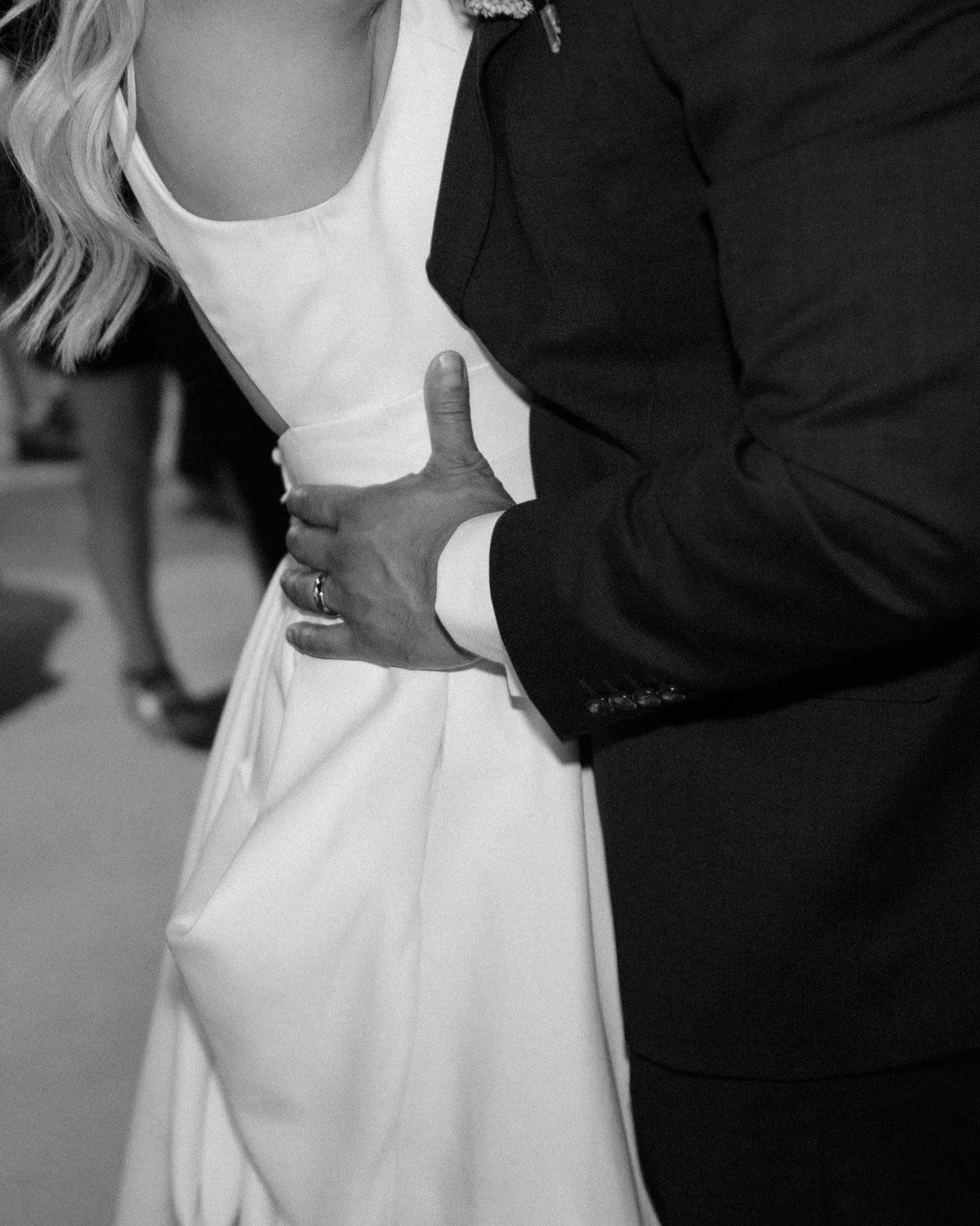 editorial photo of bride and groom dancing
