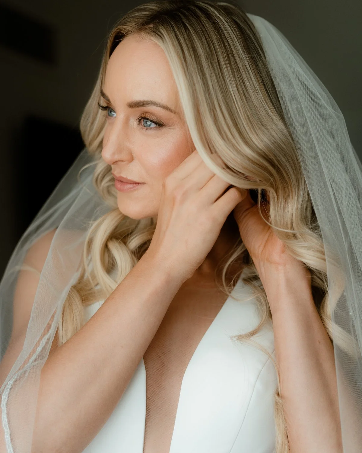 best wedding photographer in queenstown with photo of nz bride with amazing bridal hair
