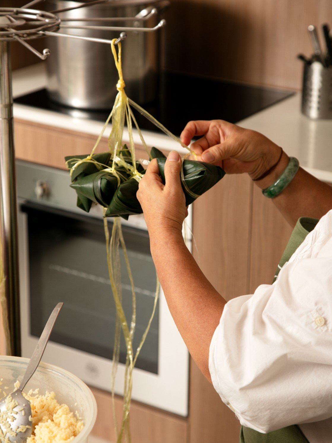 Tying Dumplings (Cropped In).jpeg