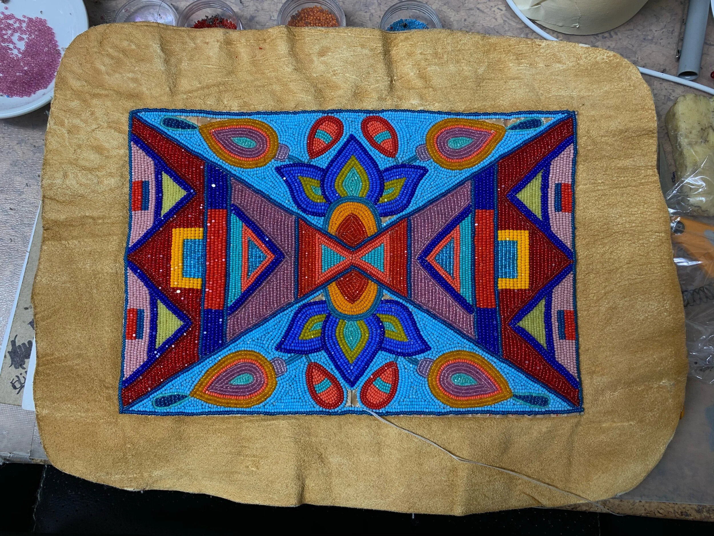 Wells Fargo debit card collaboration 
Old Venetian glass seed beads, smoked deer hide, 
2021 completed.
1/5 indigenous artists picked out of 500+, narrowed down to 5.
Beadwork image on bank card still available to Wells Fargo customers in the " galle