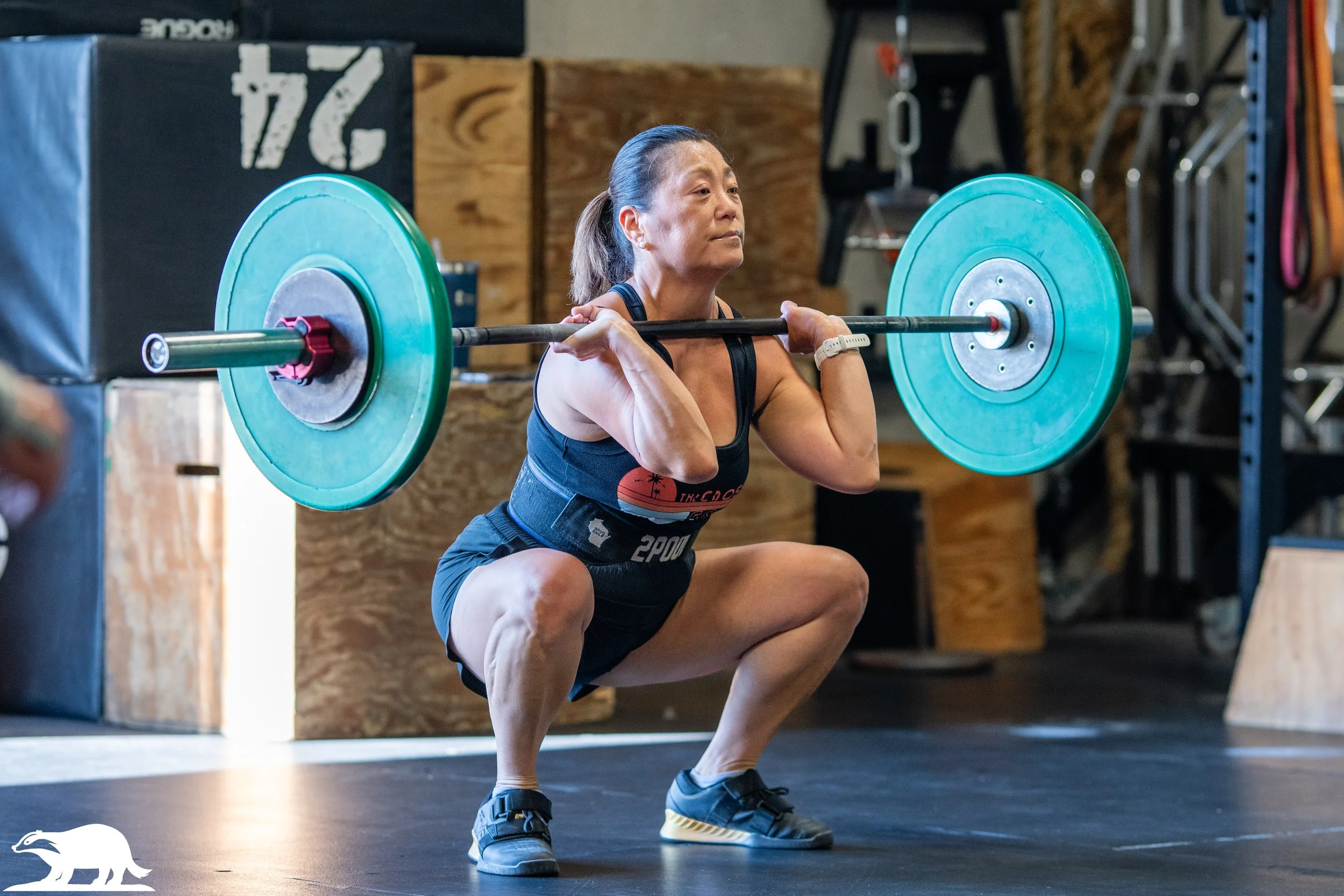 woman barbell clean