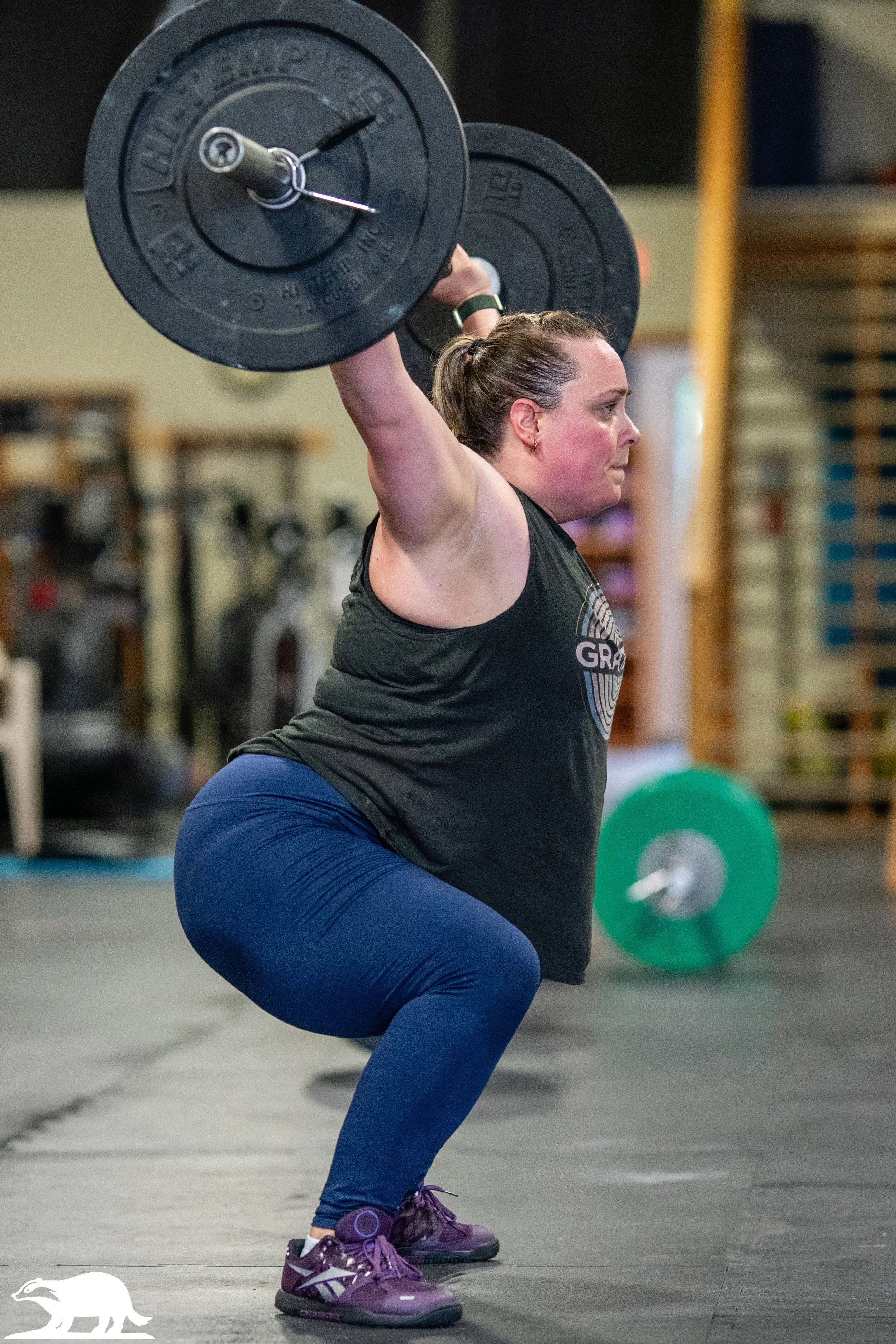 woman barbell snatch