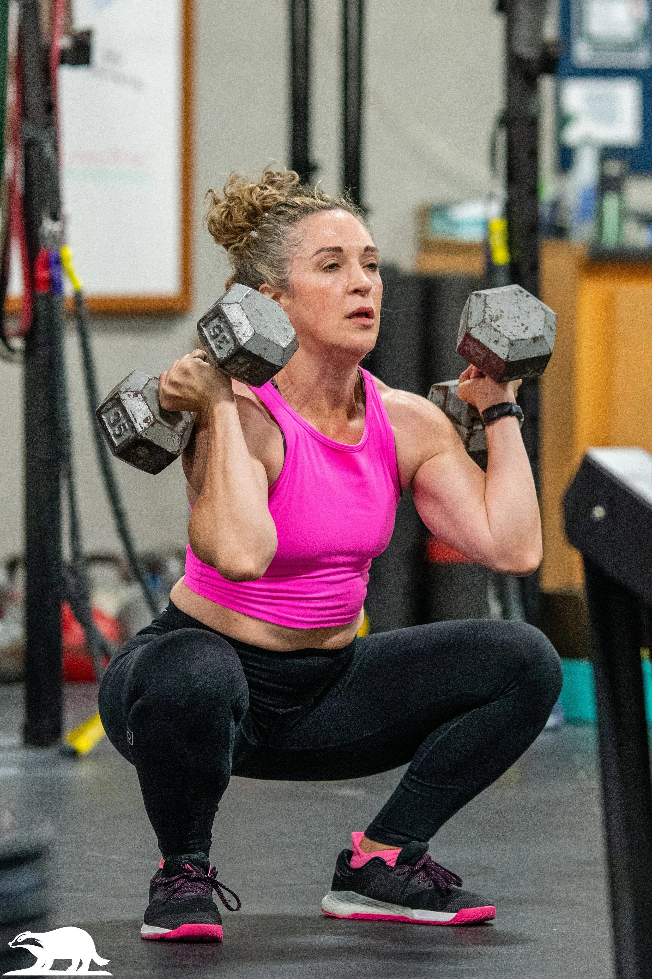 woman dumbbell clean