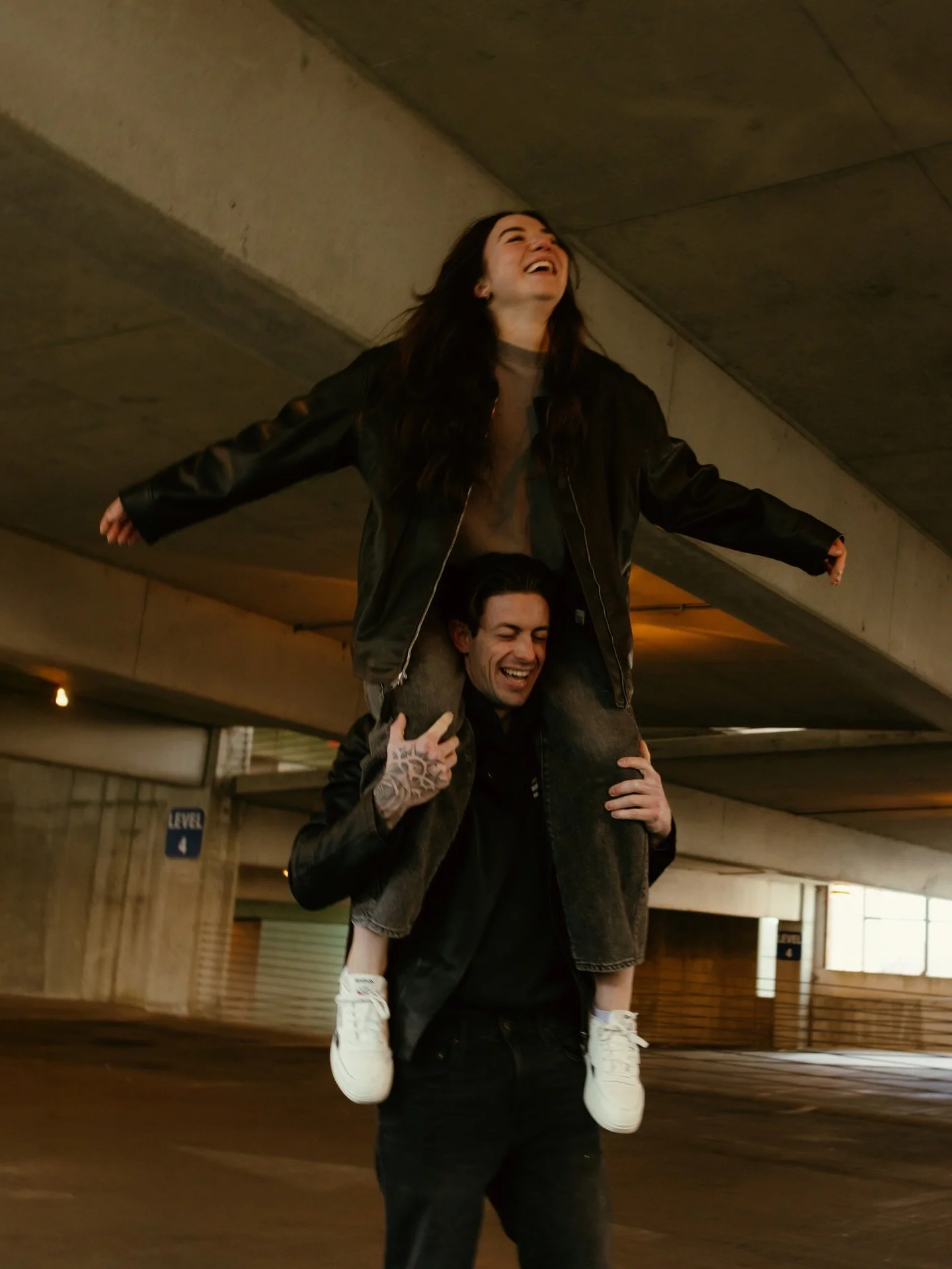 2026 for lovers. It&rsquo;s your story, your smiles, and your connection, all captured exactly as you two are. Let&rsquo;s create some sick stuff this year!! 🖤

 P.S getting on your partners shoulders is totally optional&hellip;. Unless you&rsquo;re