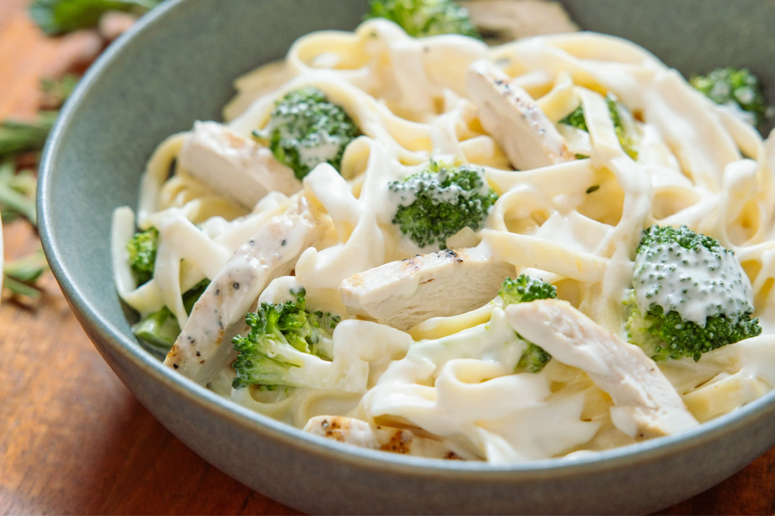 Creamy chicken and broccoli pasta in a bowl