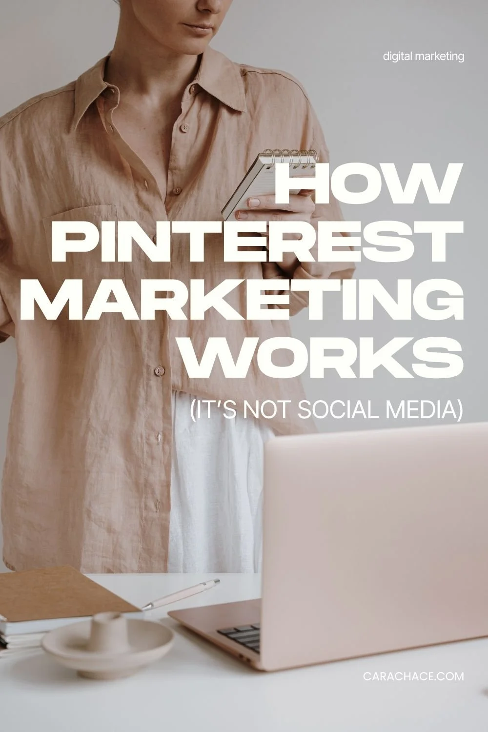 Pin reading How Pinterest Marketing Works (It's Not Social Media) over a woman in a linen shirt at a desk with a laptop