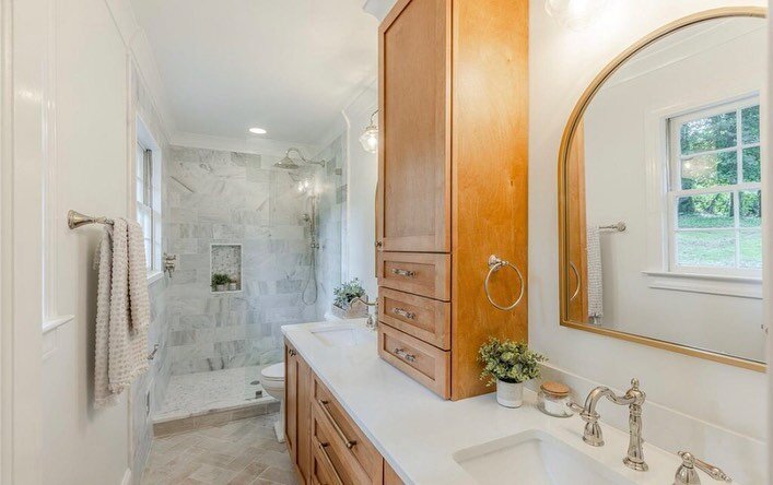 Bathroom before + after! 

In keeping the design theme throughout the house we added arched mirrors (matching the barrel entry + arched window in the living room) stained the vanity to match the island kitchen + floating shelves. Lastly we kept the b