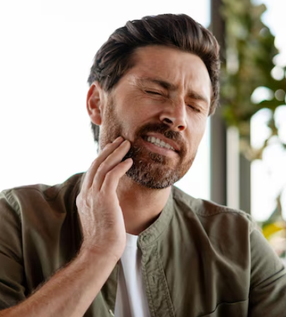 man with TMJ pain