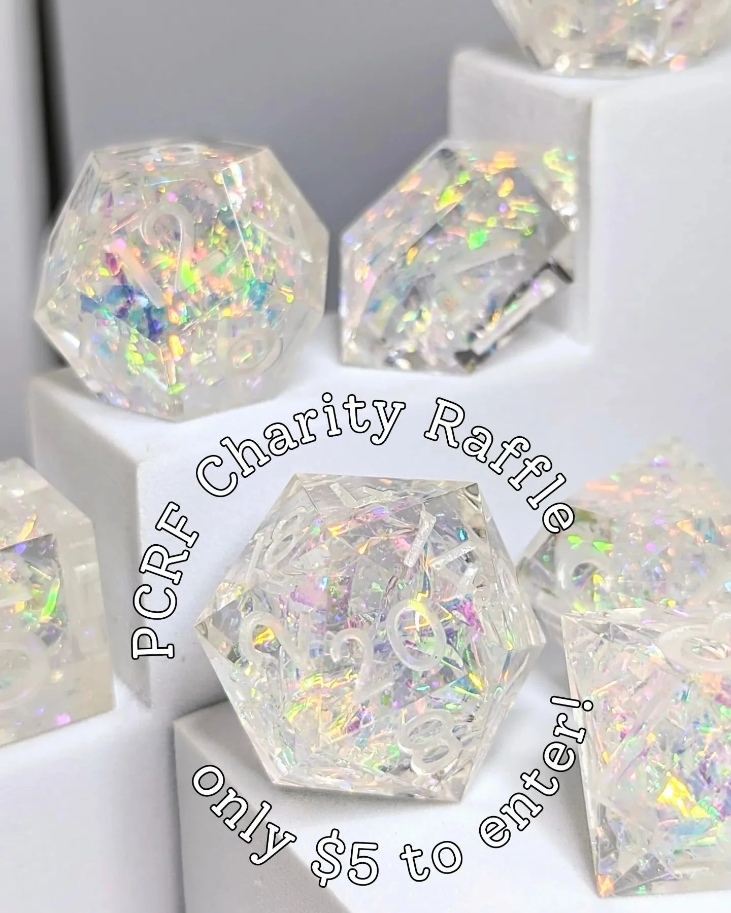 🍉 PCRF Charity Raffle 🍉

Children shouldn't be endangered by political conflict, but too often they're among the most vulnerable in times of crisis. This week we're raffling off this set of handmade iridescent dice with all proceeds going to PCRF, 