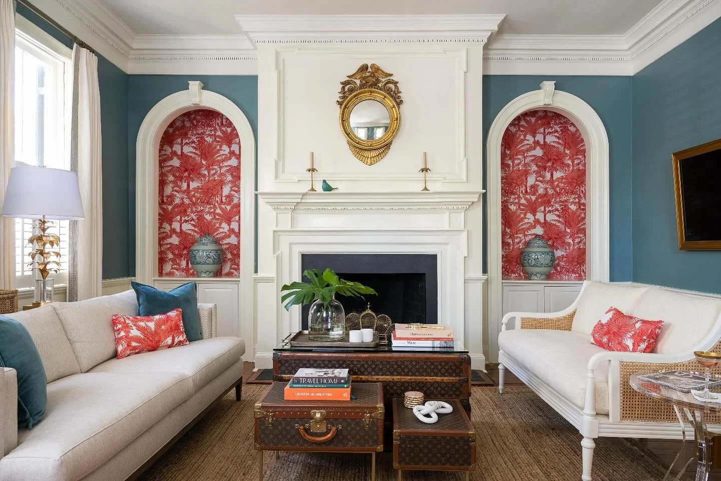 Shake off the Sunday scaries with a little escape to this stunning living room on historic King Street in Charleston, South Carolina.

Working with classic millwork and antique touches, we brought the space to life with saturated color and a little t