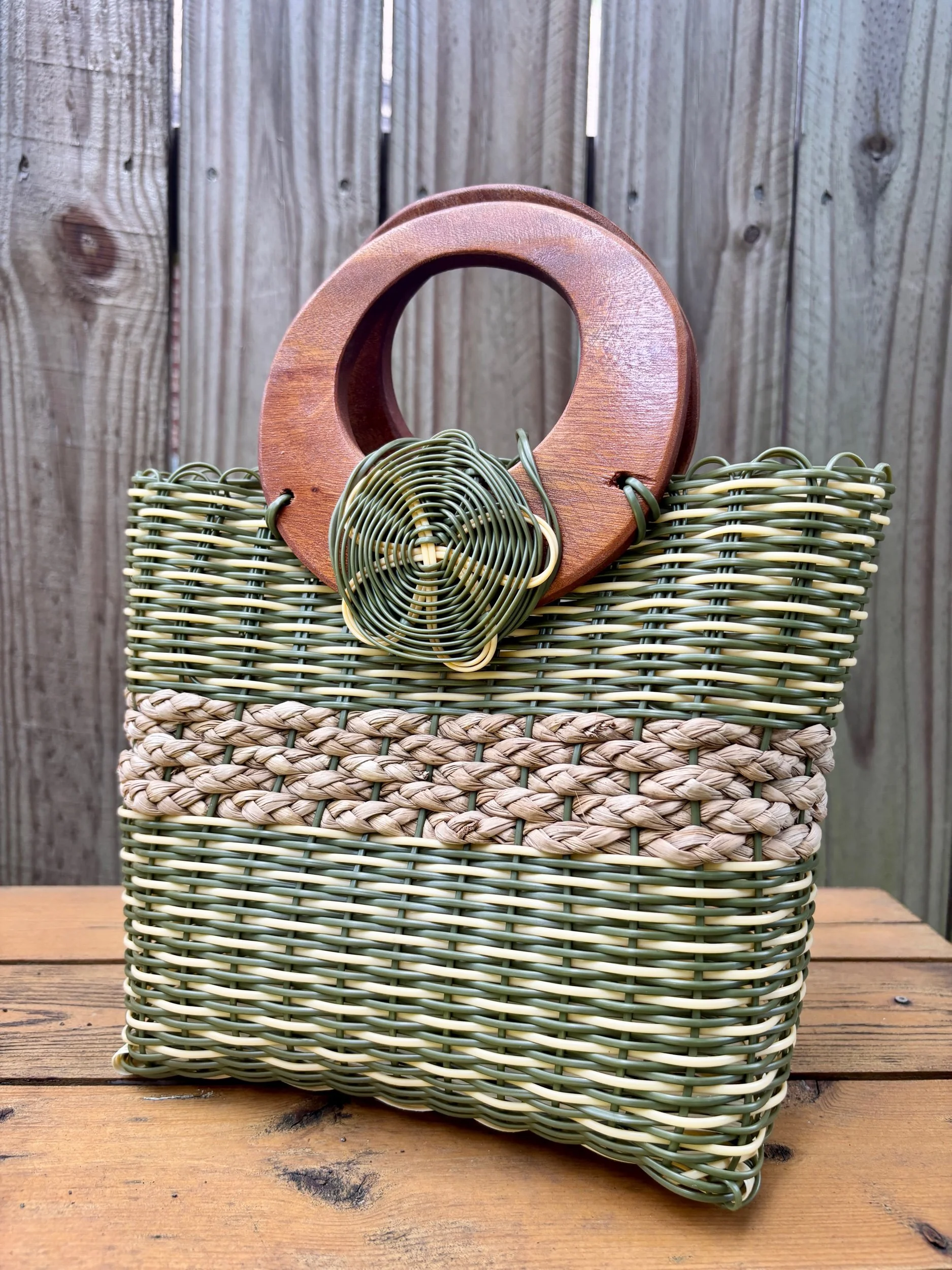 Olive green handbag made with up cycled materials.
