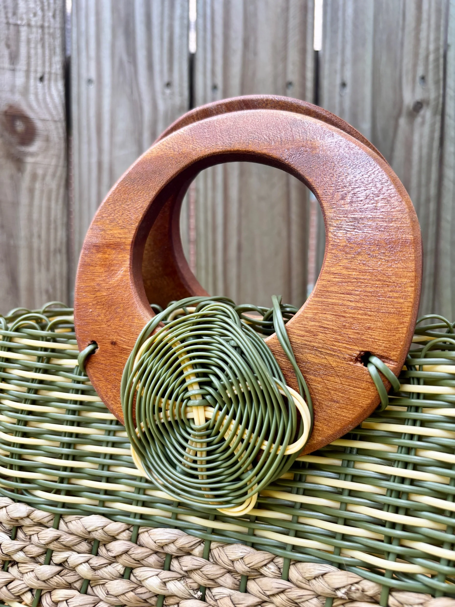 Wood handle accessory handbag.