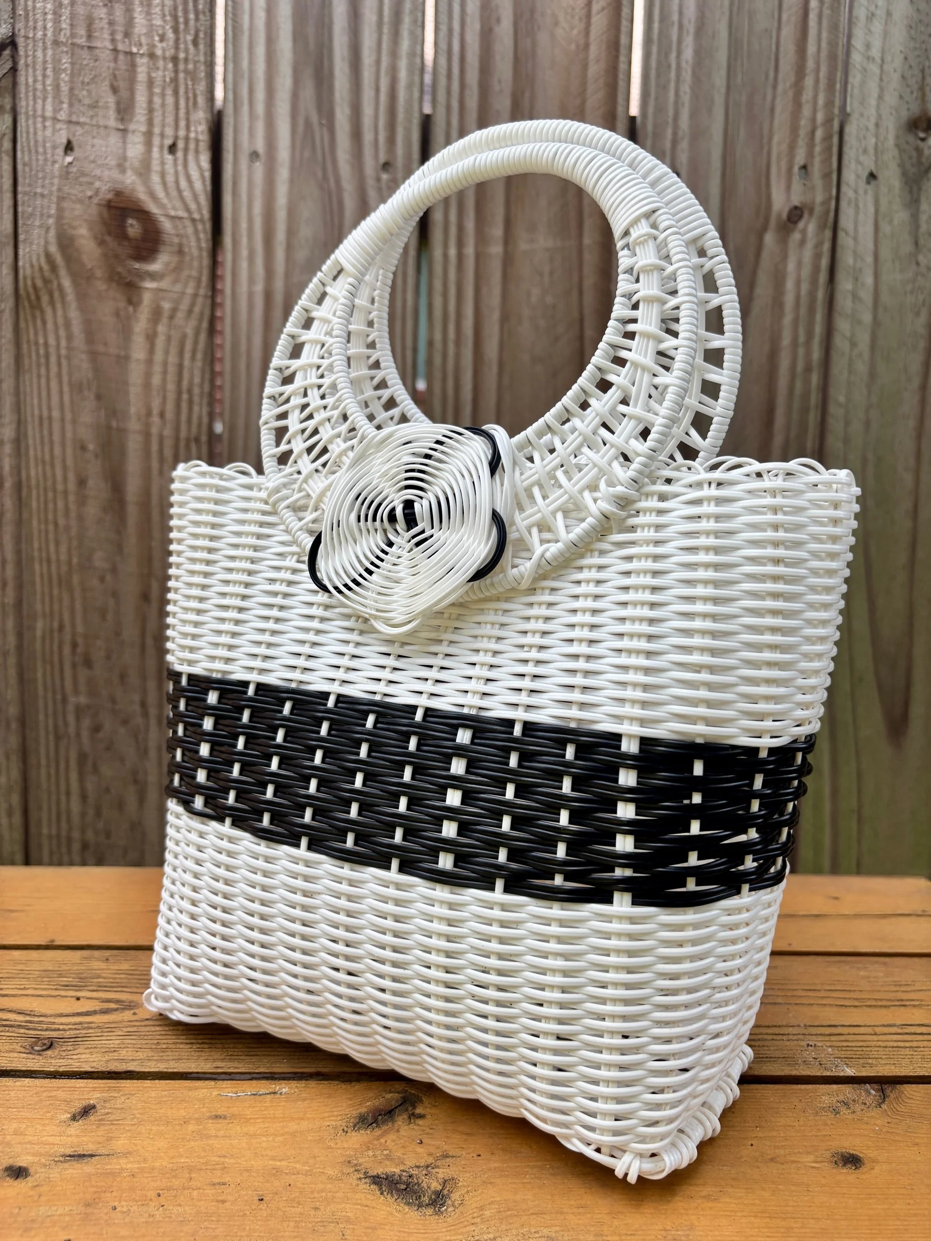 White and black handmade bag.