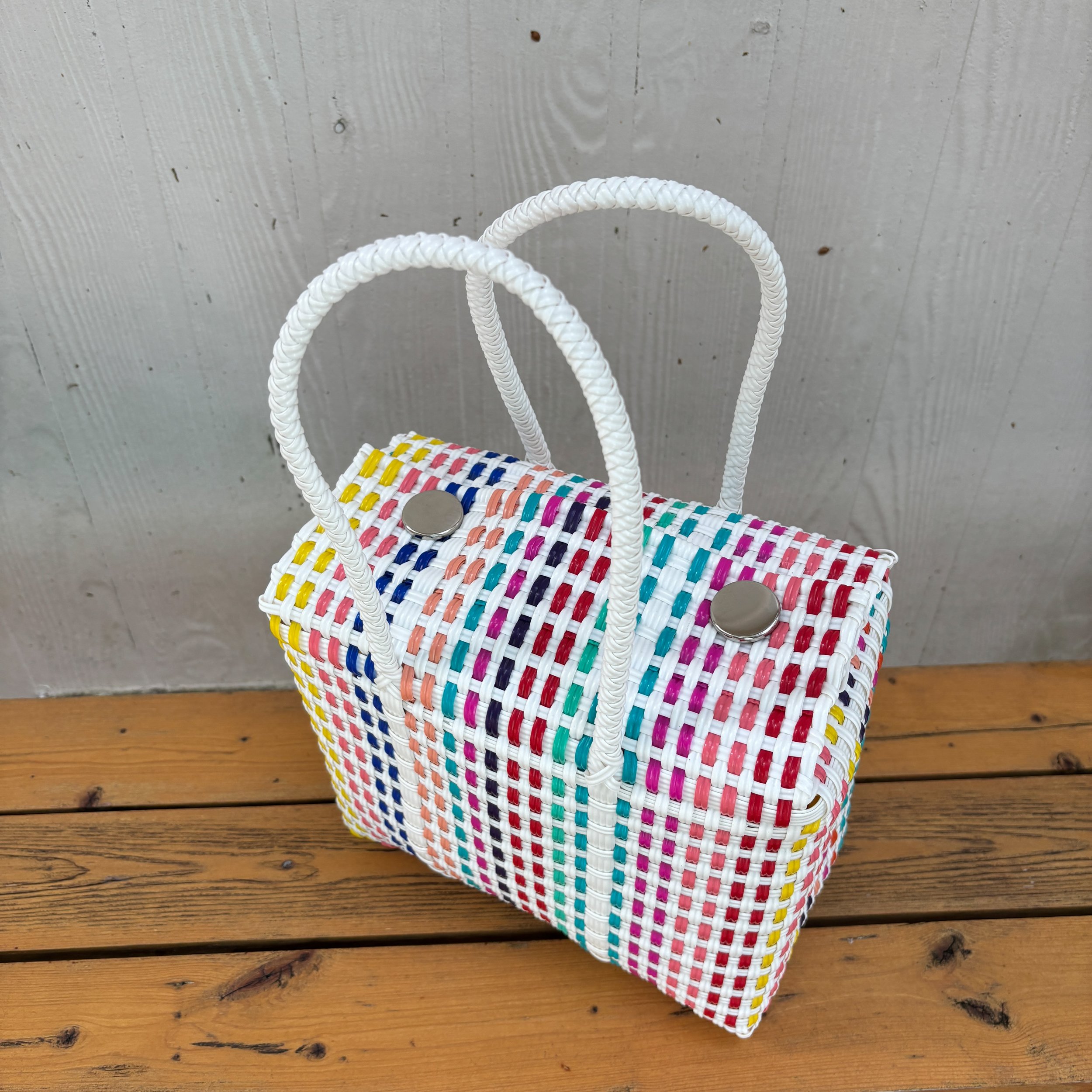 A mini handbag made from recycled plastics.