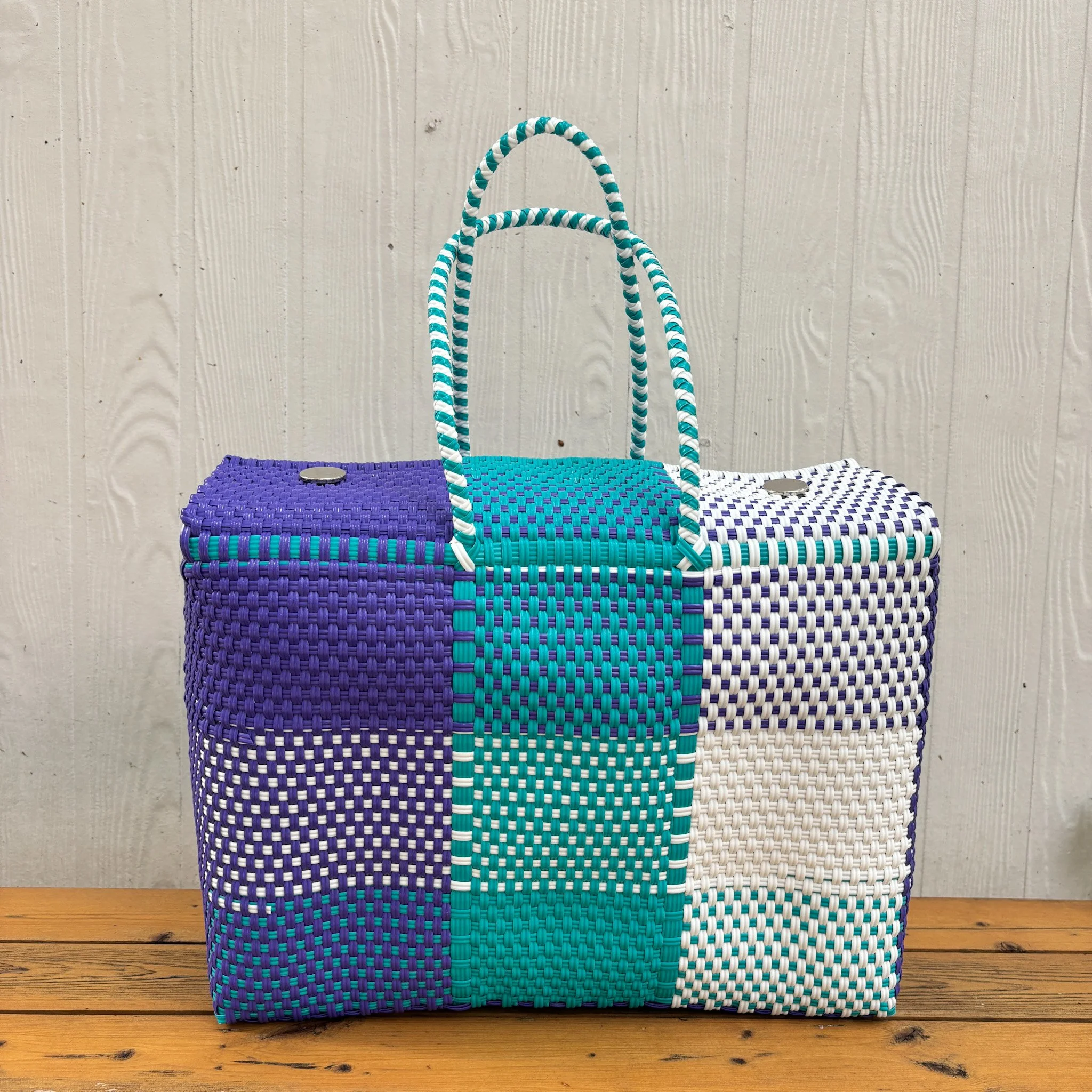 Blue and white handmade duffle bag