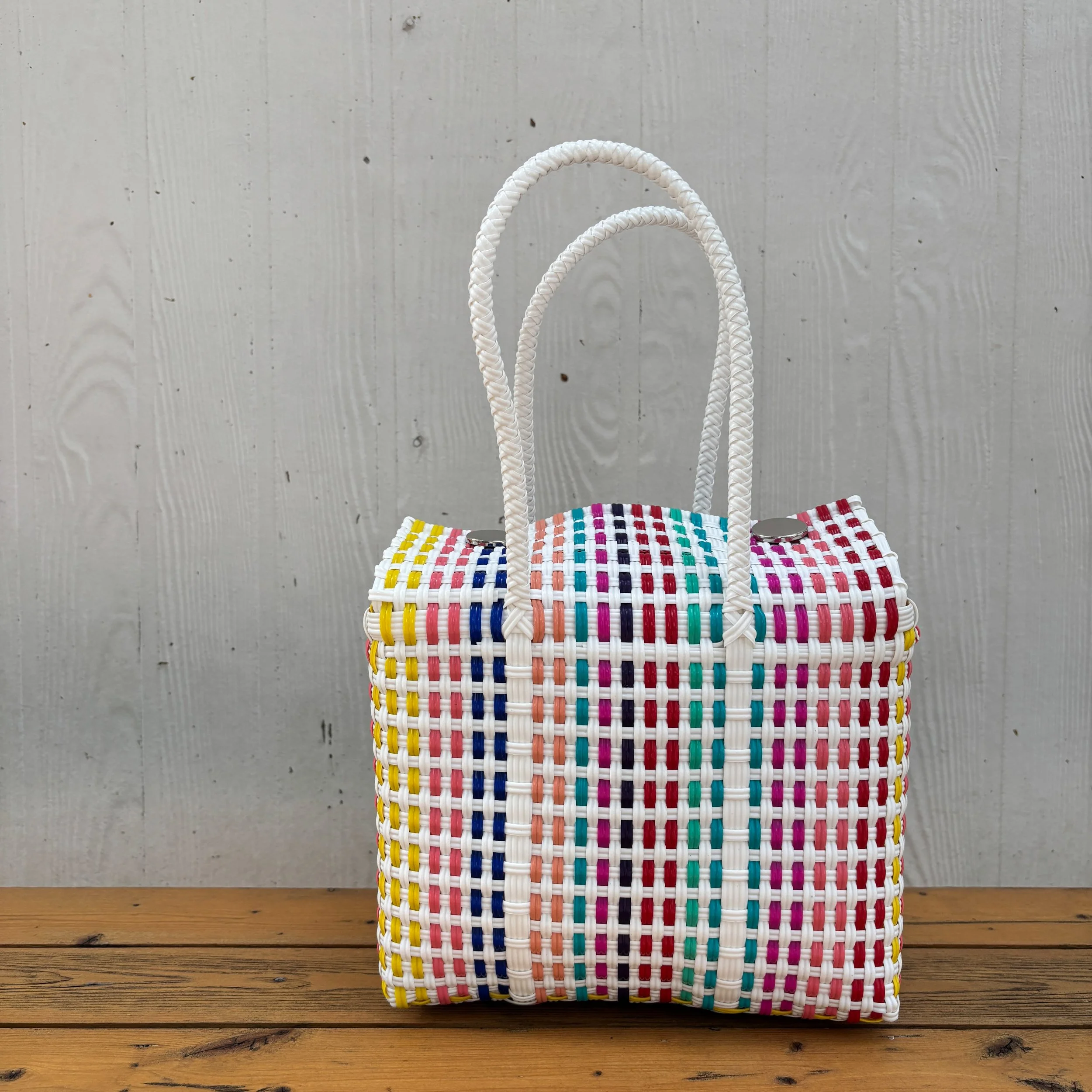 Colorful handbag made from recycled plastics.