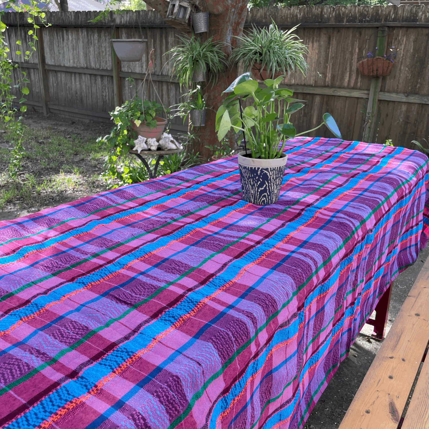 Colorful artisan tablecloth in purple and blue tones for cozy home decor