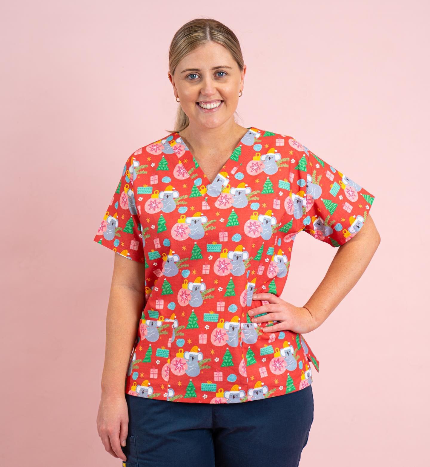 My simply ah-mazing model Maddie here is wearing a size 12 Christmas Koala. She also wears a size 10 comfortably so you can choose your fit!

We have a size chart on our site so you can compare the scrubs to your current work ones. If you can&rsquo;t