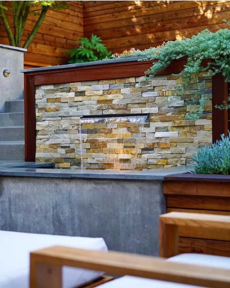 A San Francisco residential landscape design remodel with modern flair, expert craftsmanship, beautiful planting, amenities, irrigation, site lighting, retaining walls, wood deck, hot tub, spa, patio, BBQ, fire feature, bench, and paving.
