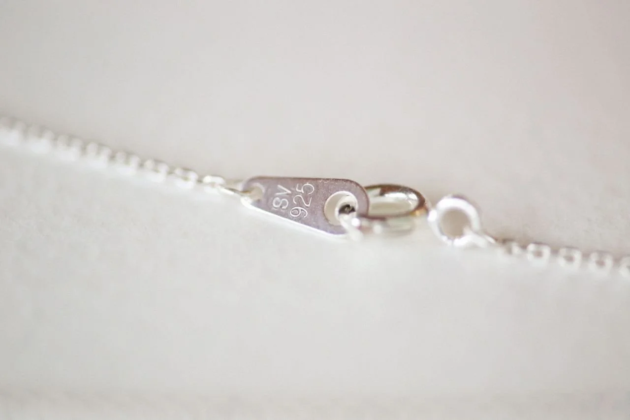 What do the stamped numbers and letters on my jewellery mean?