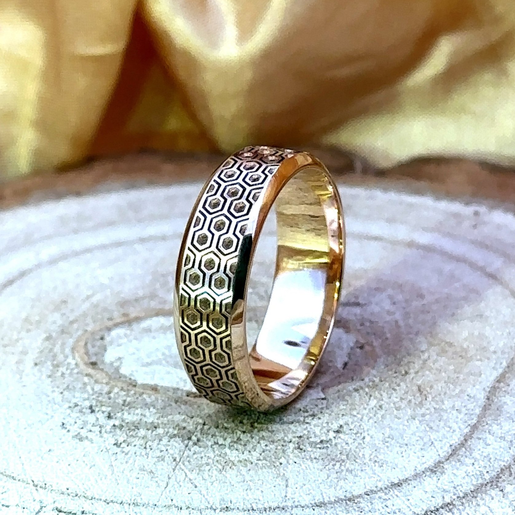 Bespoke bevelled edge wedding ring made from customers own metal with 'The Shining' inspired engraving.