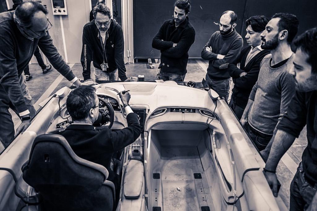 Flavio Manzoni and his team working on the interior resin model of the Ferrari Roma