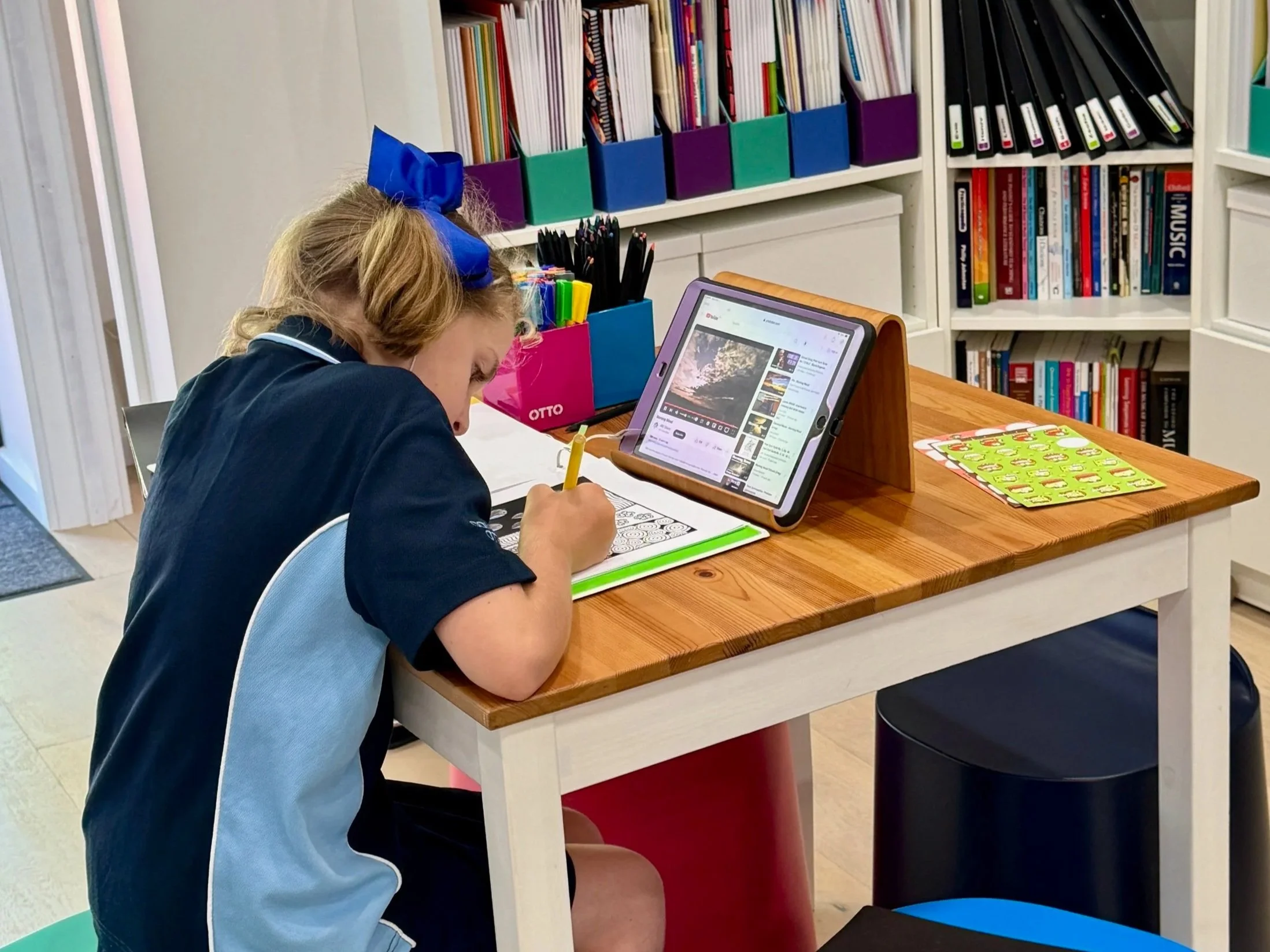 student sitting at table