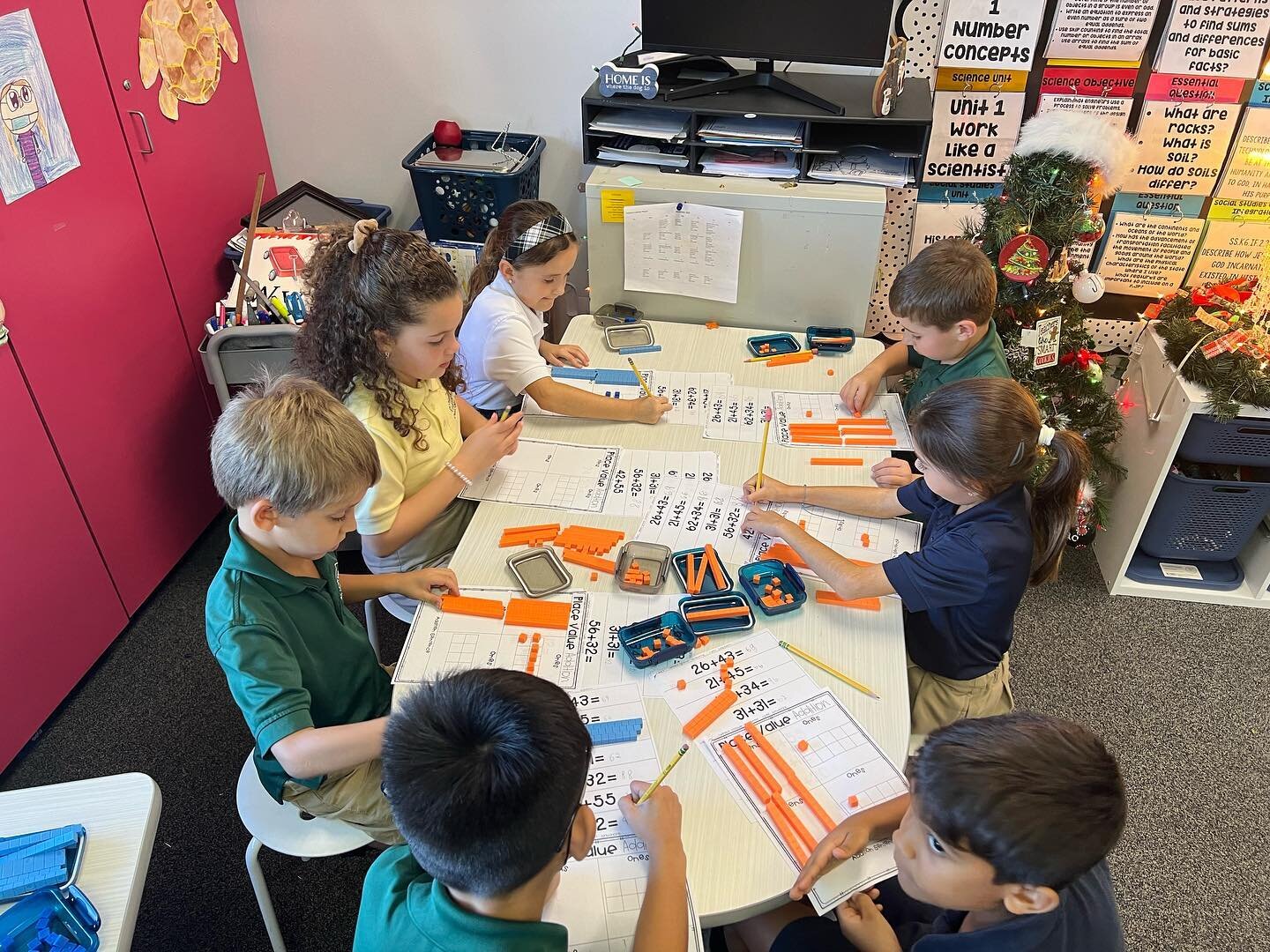 St. Andrew students enjoy using manipulatives and collaborating during center based activities. #thisisstandrew #catholicschool #manipulatives #collaboration #centerbasedlearning #students #capecoral #swfl #florida #blessed