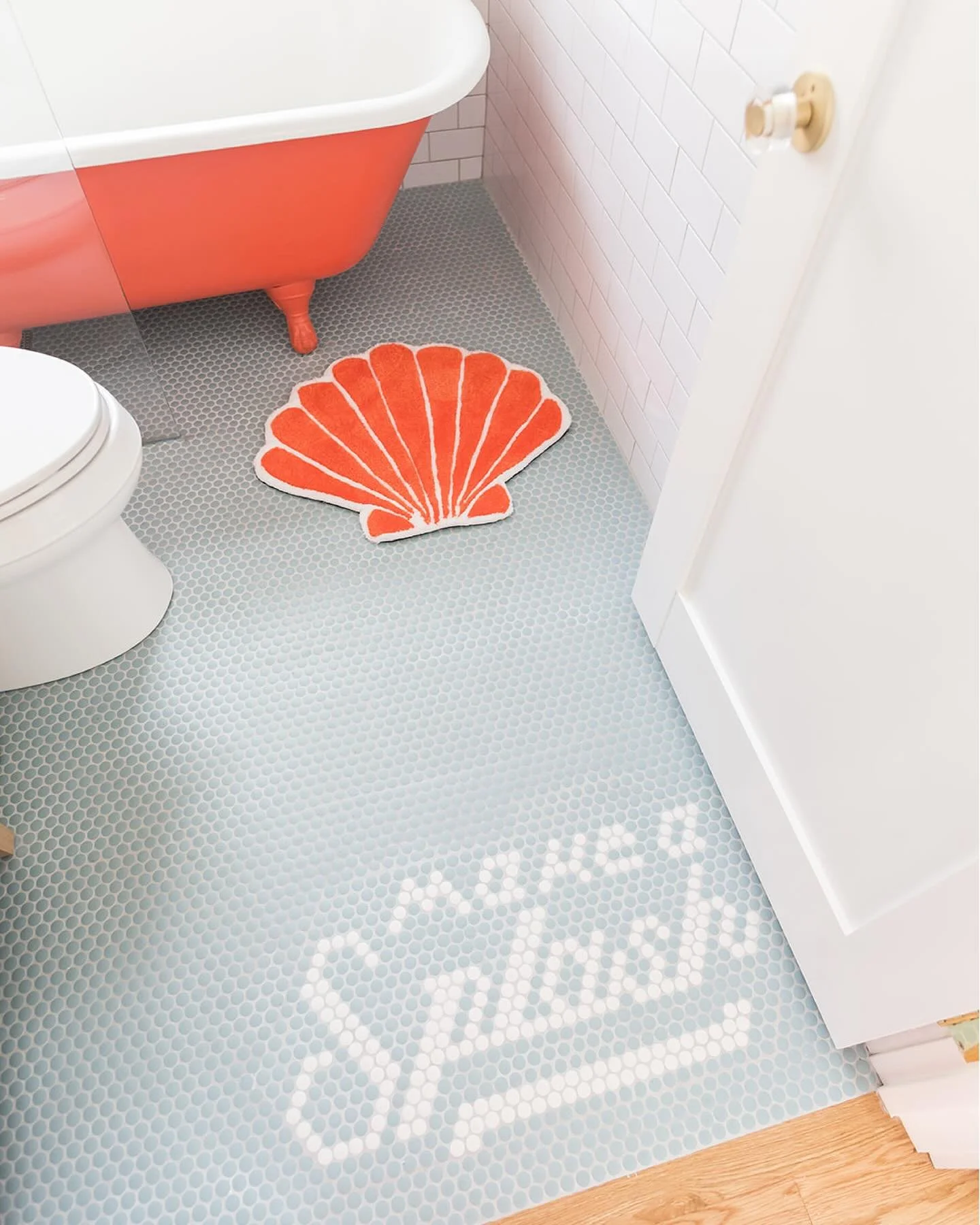 we had fun with the bathroom tile at the #mixedusemini! as this property is a short-term rental, we wanted to create a playful vibe for our guests, so we added a cute saying into the floor tile at the threshold, then added a simple wave design into t