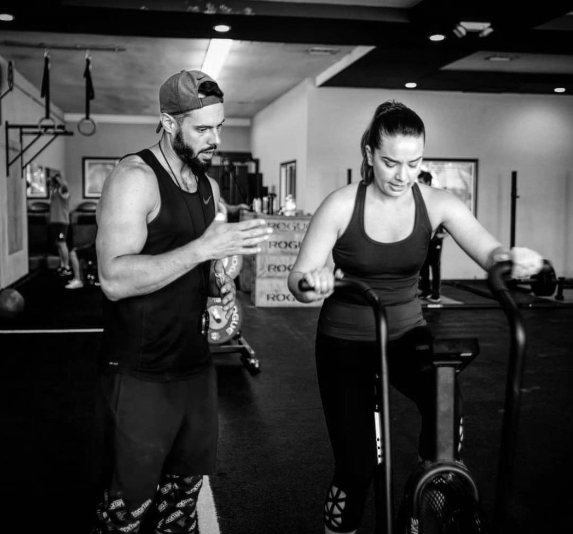 Personal trainer with a client in studio city at a private gym strength training