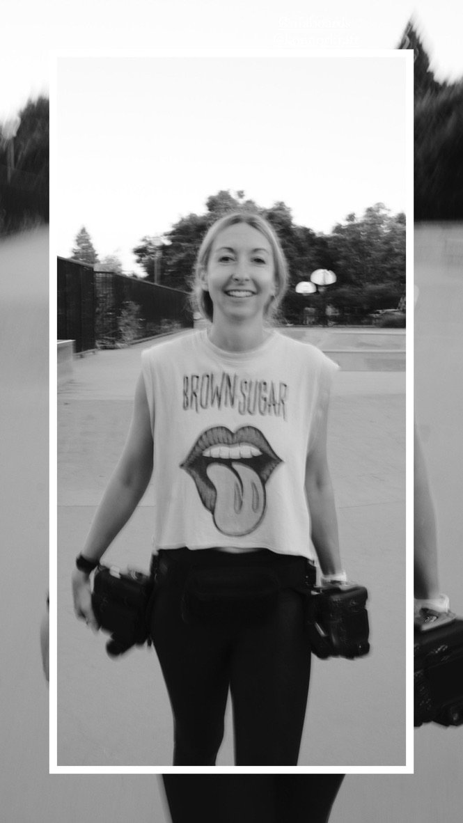 Michaela Joy working with camera gear on location, event photographer and mentor providing business coaching for creative entrepreneurs.