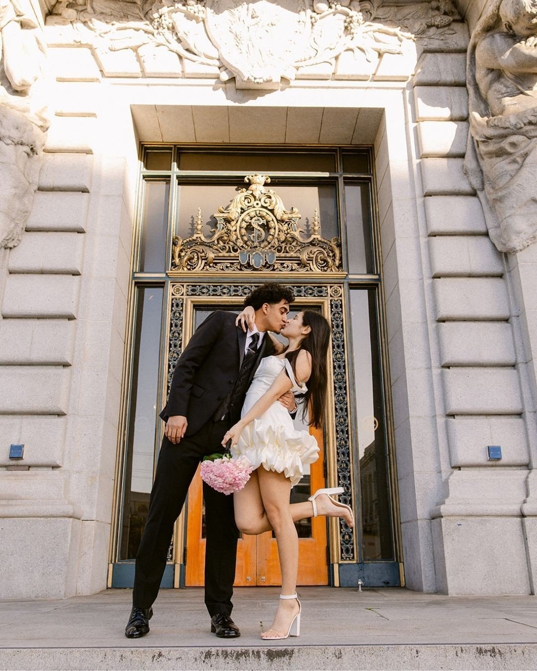 Radiant in ruffles ✨️⁠
⁠
Jessica + Angel stole the show during their City Hall elopement, and the short, stylish ruffles definitely kicked it up a notch!⁠
⁠
It's a dress I can't stop thinking about!⁠
⁠
What would your dream elopement dress look like?