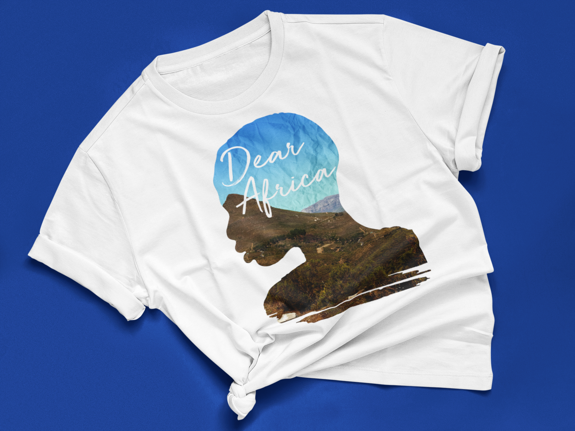 mockup-of-a-knotted-tee-lying-on-a-flat-surface-41398-r-el2.png