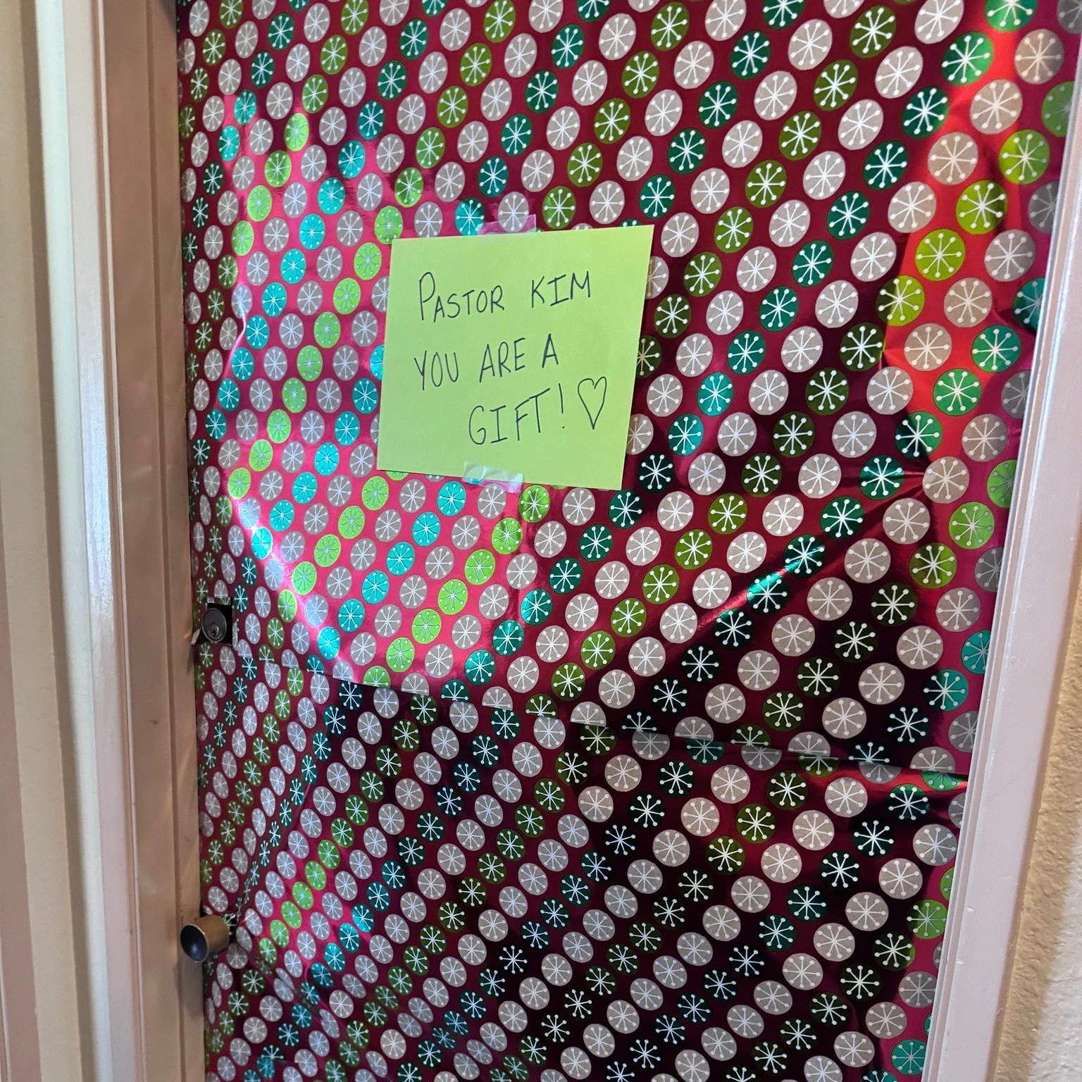 When the boss is away&hellip; Megan likes to play! 🤣 While Pastor Kim was away on study leave, our Director of Worship Arts, Megan, decided to wrap things up&mdash;literally! She covered Pastor Kim&rsquo;s office in wrapping paper with a sign on the