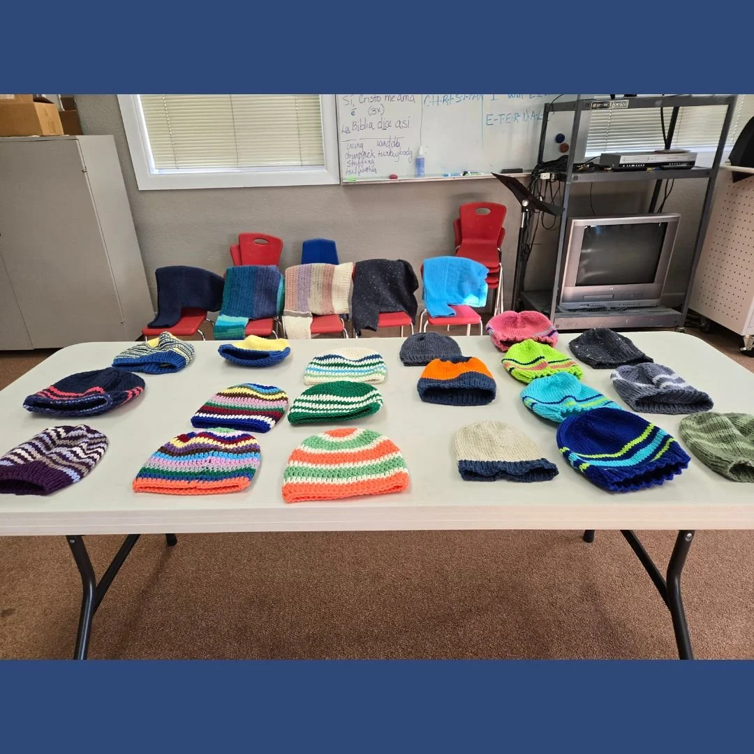 Caps and sweaters lovingly knit by our Knit for Kids group! These handmade items are shared with those who are unsheltered and those in need along the border. Interested in participating? Reach out to the office for more information!