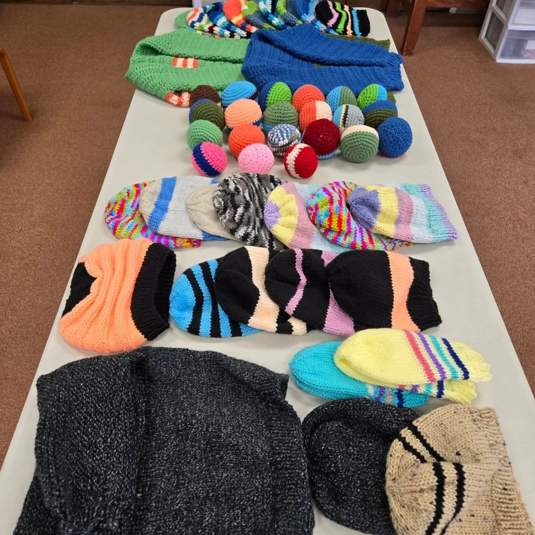 Another snapshot of the colorful sweaters, caps, and balls that have been knit recently by our Knit for Kids Group to be distributed at a school down in Tijuana. Knit for Kids meets on a monthly basis. Reach out to the church office if you are intere
