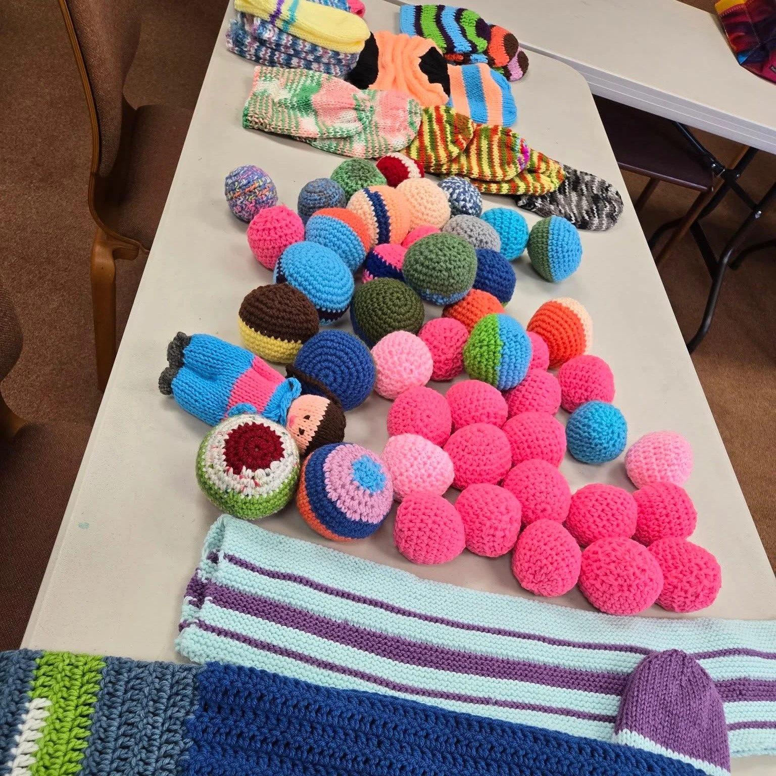 Here is a recent snapshot of the sweaters, caps, and balls our Knit for Kids Group made for the preschool in Tijuana! Our Knit for Kids Group meets on a monthly basis. Reach out to the office for more information if you would like to participate! 🧶
