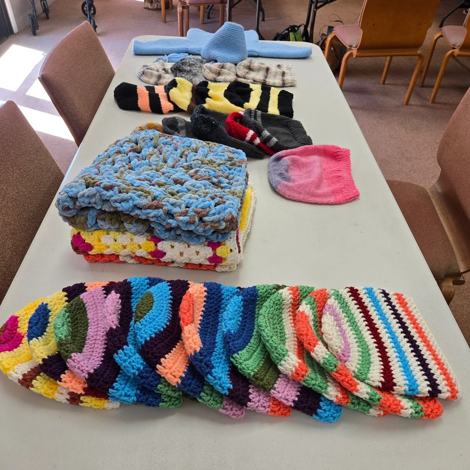 Stitches of Love! Sharing the most recent creations from our Knit for Kids Group, who gather each month to knit and crochet with love. These special handmade treasures are headed to a preschool in Tijuana, where they&rsquo;ll bring warmth, comfort, a