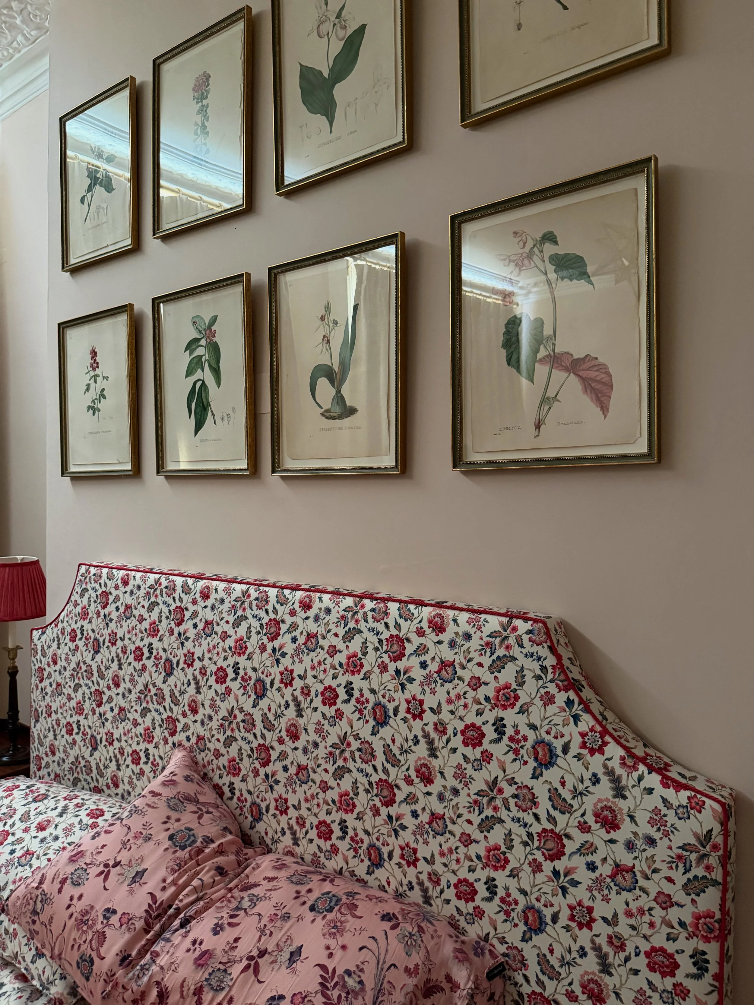 An upholstered headboard. A 2026 interior design trend.