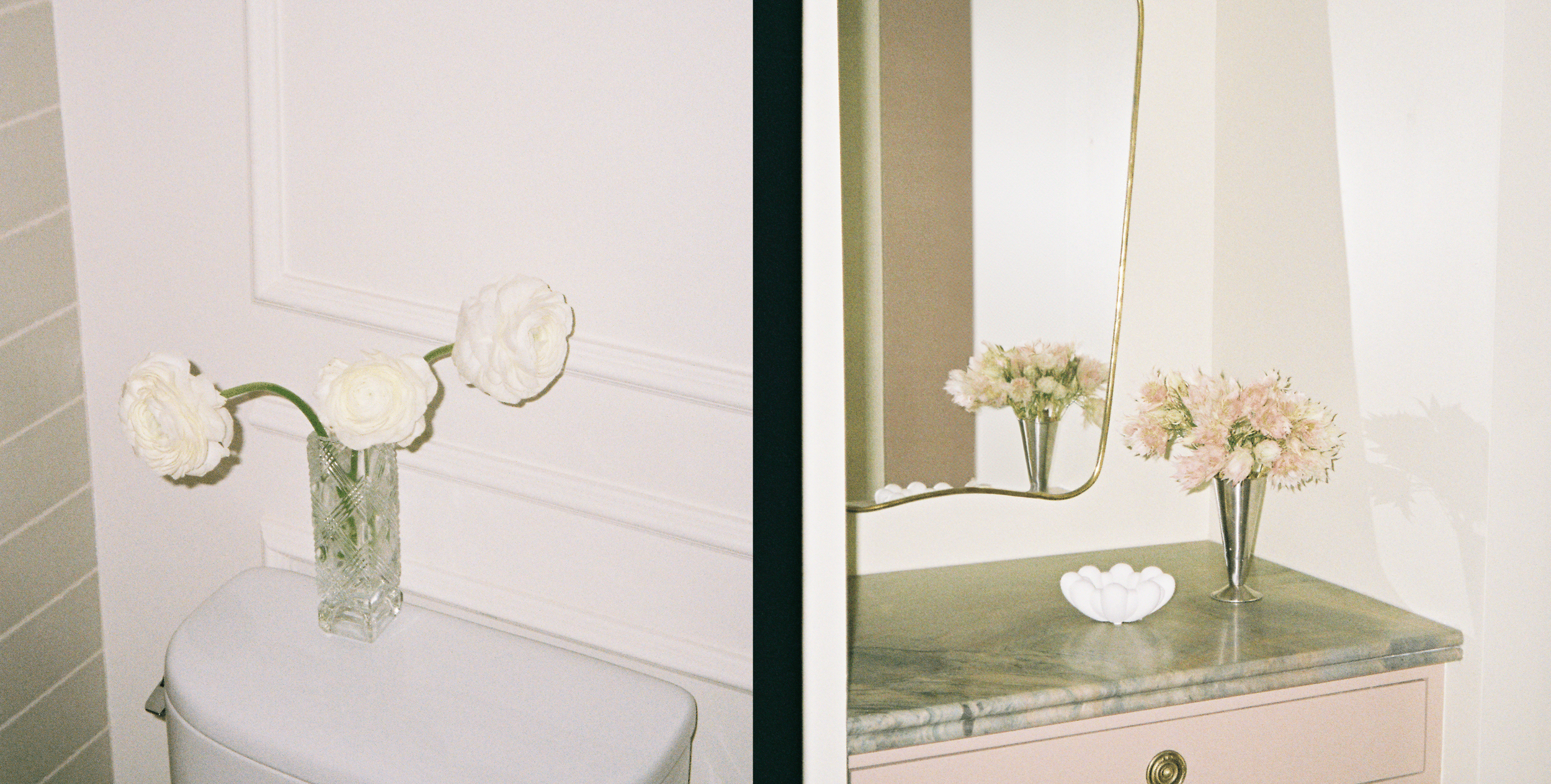 Flowers positioned on marble vanity and bathroom surfaces shot on 35mm film for Spearman Spaces a SF based full-service interior design studio