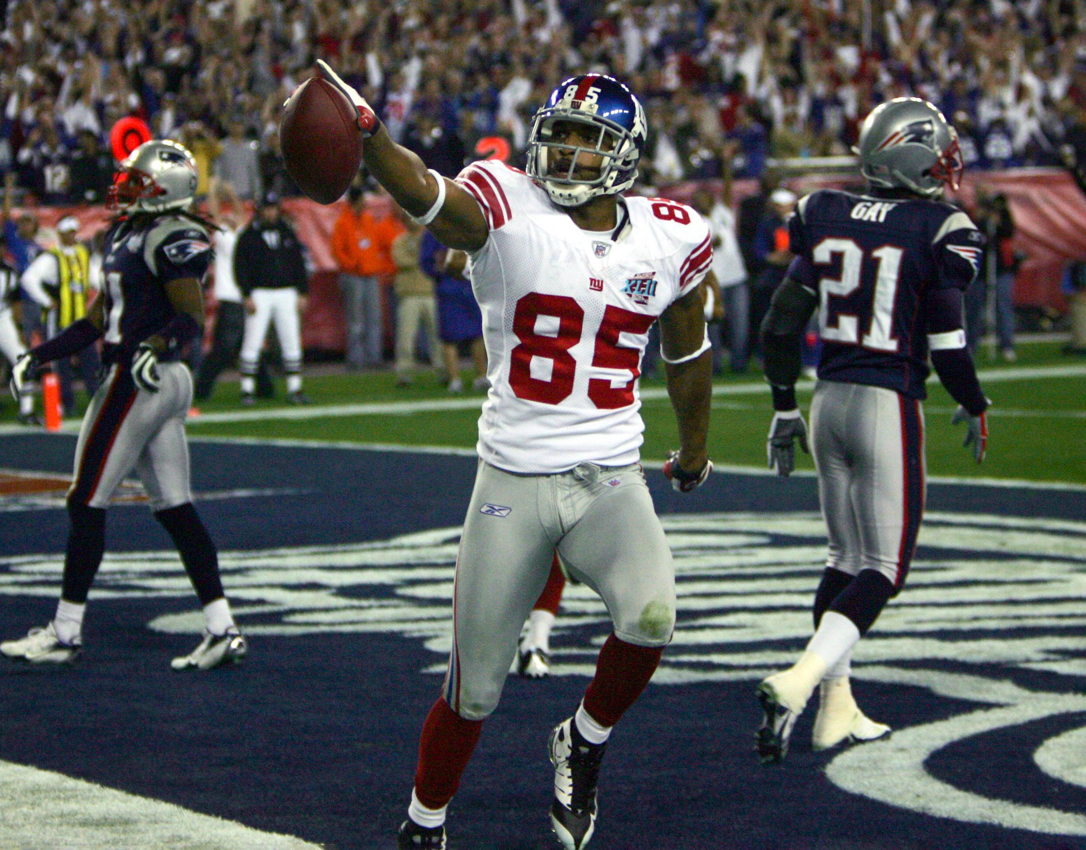 Giants WR David Tyree celebrate a touchdown catch.