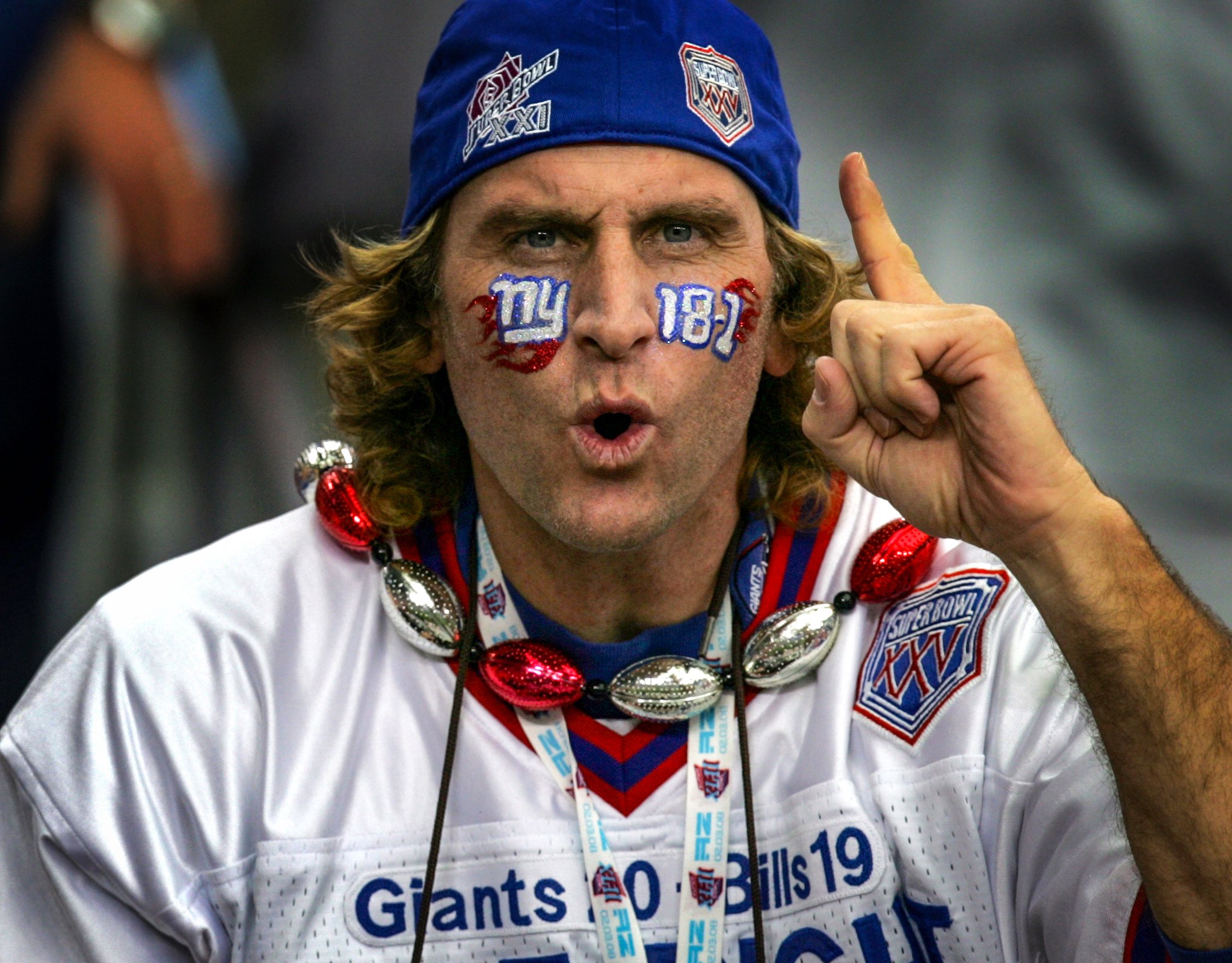 Iconic Giants fan Joe Ruback, commonly known as License Plate Guy, cheers on his team.