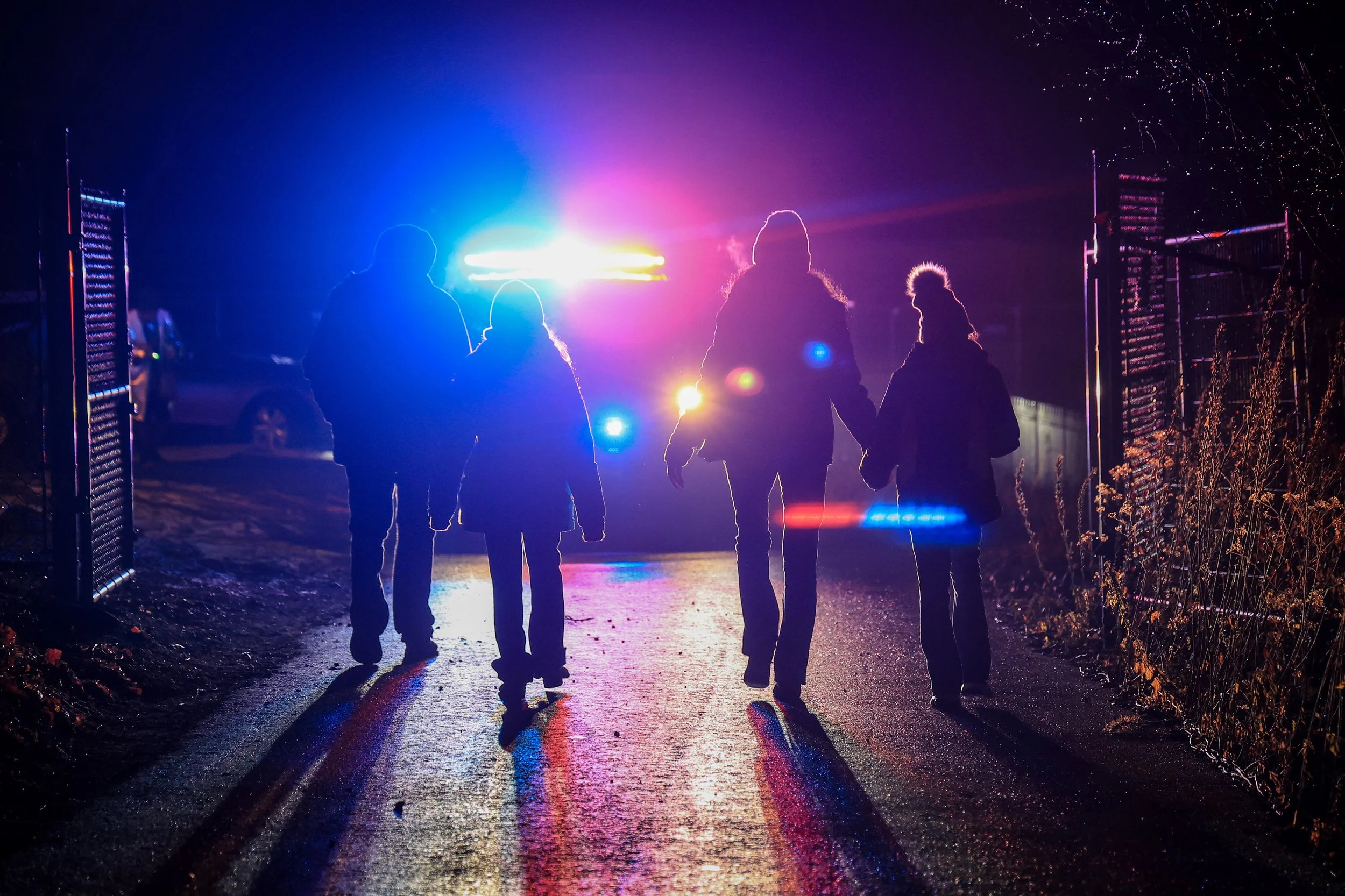 PATERSON, N.J. | 12/23/25: A family walks past a police vehicle as they arrive at the Riverwalk Christmas Celebration. The event highlights the city’s long-awaited Riverwalk project, envisioned as a safe, family-friendly destination and a key step in